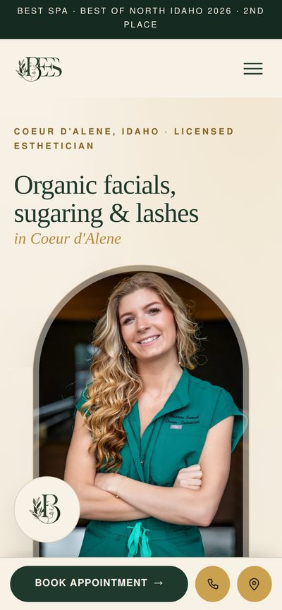 BEEs Day Spa’s website shown on a phone, an esthetician studio in Coeur d’Alene, Idaho
